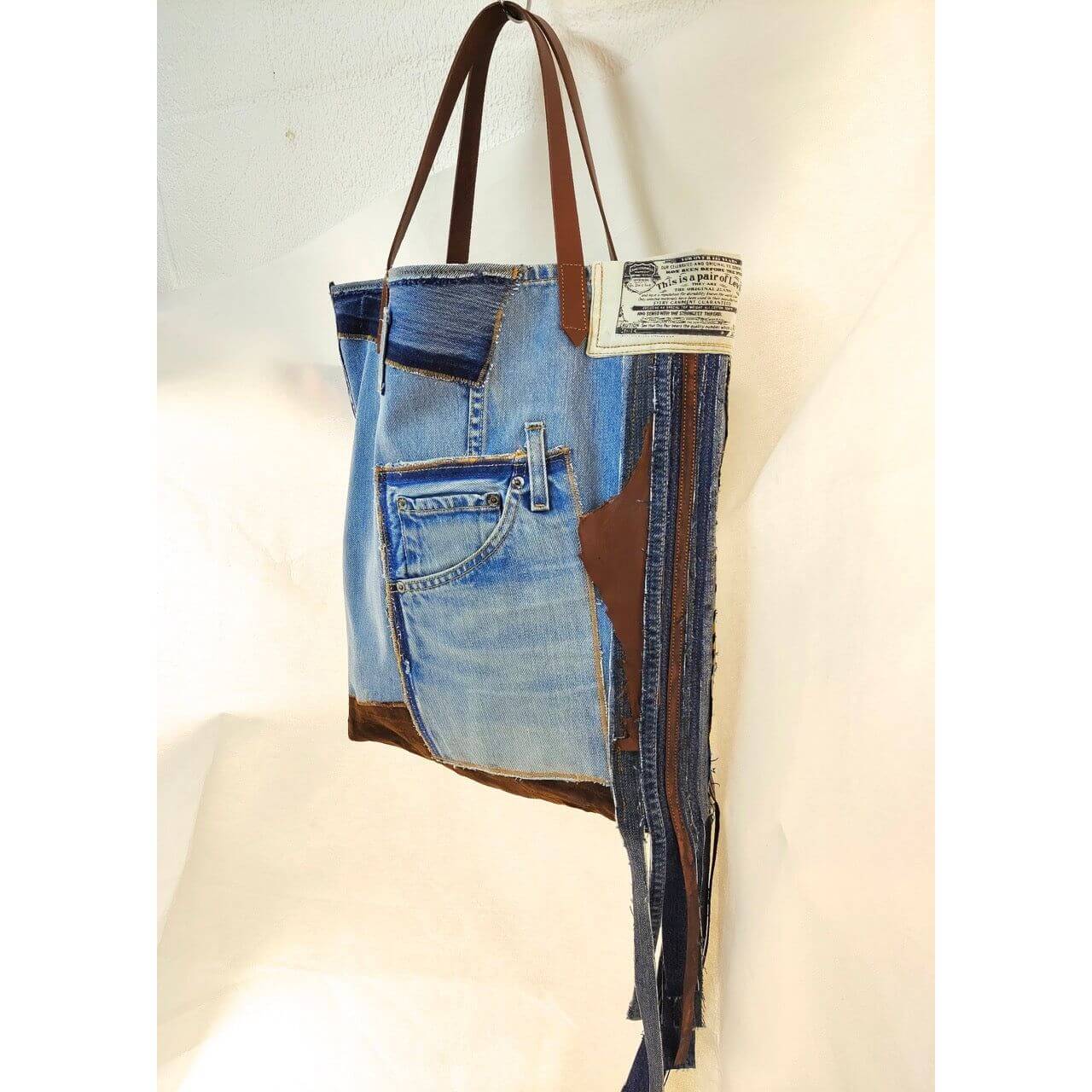 Tasseled Upcycled denim bags - Ariike Ruban Studio